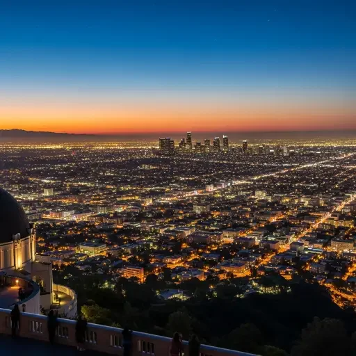 Panoramic view of Los Angeles sprawl from Griffith Observatory, showing the vast horizontal expanse of the city stretching to the mountains
